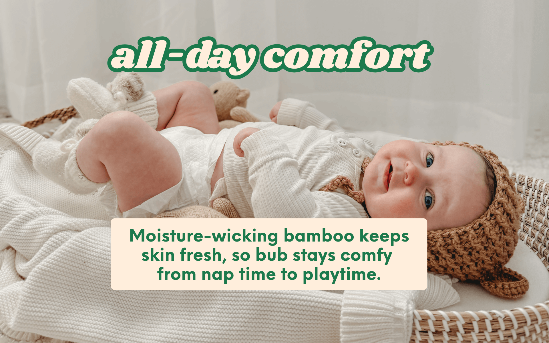 Baby wearing Cuddlies moisture-wicking bamboo nappies to keep bums dry all day