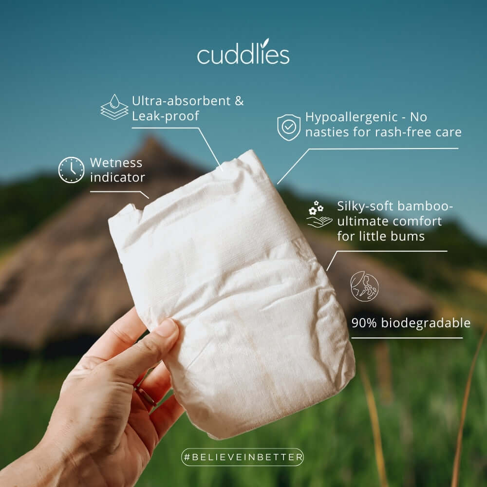 Cuddlies Bamboo Eco Nappies highlighting key features made from biodegradable materials, 12+ hour leak protection, and non-toxic