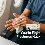 Passenger using Cuddlies Water Wipes during flight for a quick and gentle freshness check