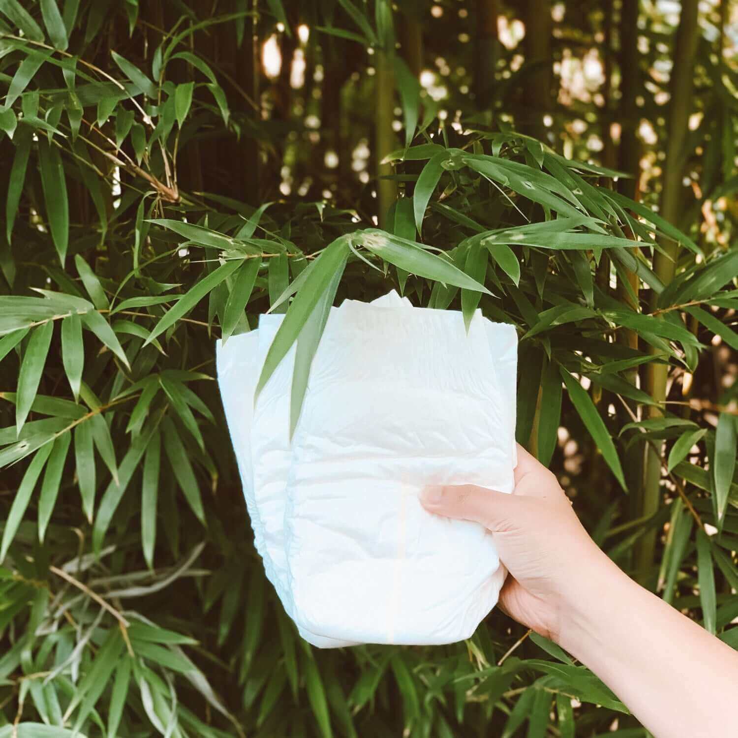 cuddlies eco nappy against bamboo backdrop