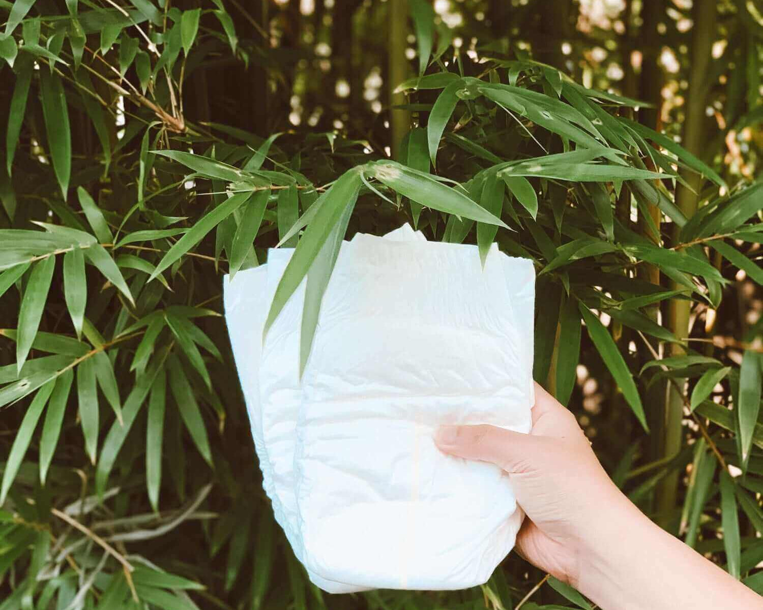 cuddlies eco nappy against bamboo backdrop