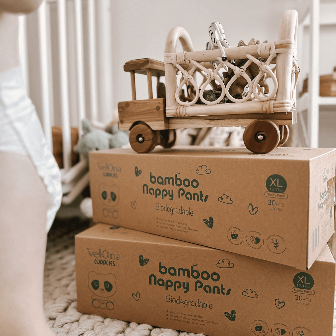Cuddlies Eco Bamboo Nappy pants with a toy wooden truck