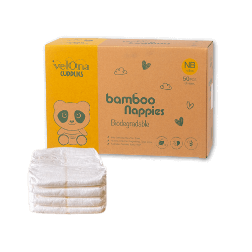 Cuddlies Nappy Size 0 Newborn with nappies stacked